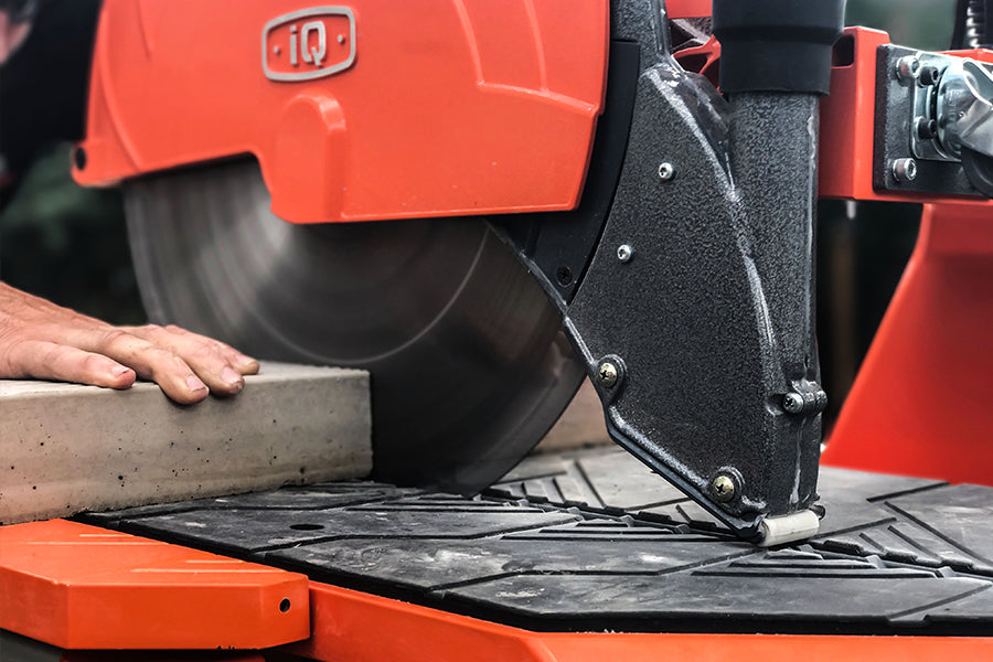Front of iQMS362 iQ Dustless Saw cutting into stone